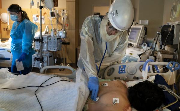 A patient is treated for COVID-19 at Providence Holy Cross Medical Center in Los Angeles. Hospitalizations because of the coronavirus are surging in California. A patient is treated for COVID-19 at Providence Holy Cross Medical Center in Los Angeles. Hospitalizations because of the coronavirus are surging in California.