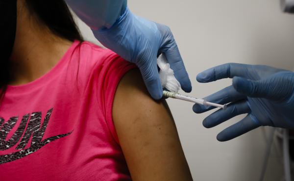 A volunteer received an injection as part of a clinical trial for a COVID-19 vaccine at Research Centers of America in Hollywood, Fla. Studies of vaccines backed by Operation Warp Speed have enrolled tens of thousands of people in a matter of months. A volunteer received an injection as part of a clinical trial for a COVID-19 vaccine at Research Centers of America in Hollywood, Fla. Studies of vaccines backed by Operation Warp Speed have enrolled tens of thousands of people in a matter of months.