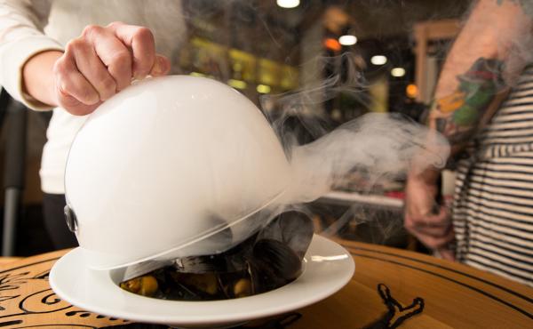 This dish — mussels smoked in pine needles and pine ash butter — was inspired by a 1605 recipe that the explorer Samuel de Champlain made for his men while traveling through Canada. It's one of many historically inspired items on the menu at the Toron This dish — mussels smoked in pine needles and pine ash butter — was inspired by a 1605 recipe that the explorer Samuel de Champlain made for his men while traveling through Canada. It's one of many historically inspired items on the menu at the Toron