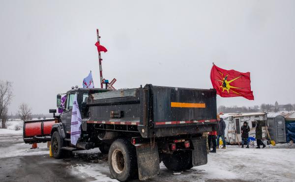 A truck sits parked at railway tracks during a protest near Belleville, Ontario, Canada, on Thursday. Demonstrators have been disrupting railroads and other infrastructure across Canada for more than a week to protest the planned Coastal GasLink pipeline. A truck sits parked at railway tracks during a protest near Belleville, Ontario, Canada, on Thursday. Demonstrators have been disrupting railroads and other infrastructure across Canada for more than a week to protest the planned Coastal GasLink pipeline.