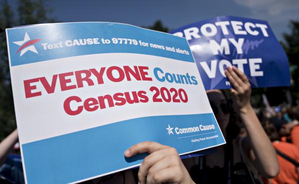 A demonstrator holds a sign about the U.S. census outside the Supreme Court in Washington, D.C., in 2019. The Census Bureau has stopped all work on President Trump's directive to produce a count of unauthorized immigrants that could be subtracted from a k A demonstrator holds a sign about the U.S. census outside the Supreme Court in Washington, D.C., in 2019. The Census Bureau has stopped all work on President Trump's directive to produce a count of unauthorized immigrants that could be subtracted from a k