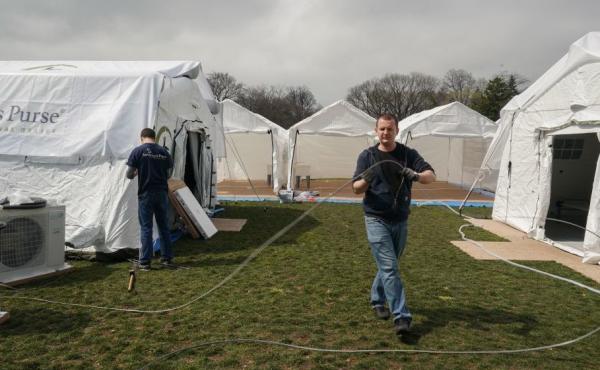 Volunteers from the relief organization Samaritan's Purse set up an emergency field hospital in New York's Central Park on Monday. Volunteers from the relief organization Samaritan's Purse set up an emergency field hospital in New York's Central Park on Monday.
