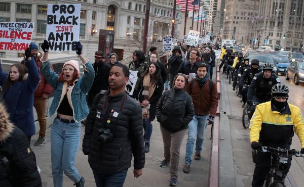 In recognition of the 50th anniversary of the death of the Rev. Martin Luther King Jr., and in solidarity with the family and supporters of Stephon Clark and others killed by police, demonstrators protest and march in the Magnificent Mile shopping distric In recognition of the 50th anniversary of the death of the Rev. Martin Luther King Jr., and in solidarity with the family and supporters of Stephon Clark and others killed by police, demonstrators protest and march in the Magnificent Mile shopping distric