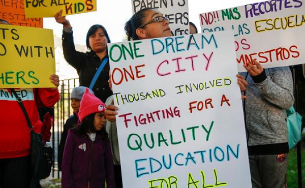 Parents, students and supporters of Chicago Public Schools teachers gather at a press conference in 2016 near Mayor Rahm Emanuel's home. Parents, students and supporters of Chicago Public Schools teachers gather at a press conference in 2016 near Mayor Rahm Emanuel's home.