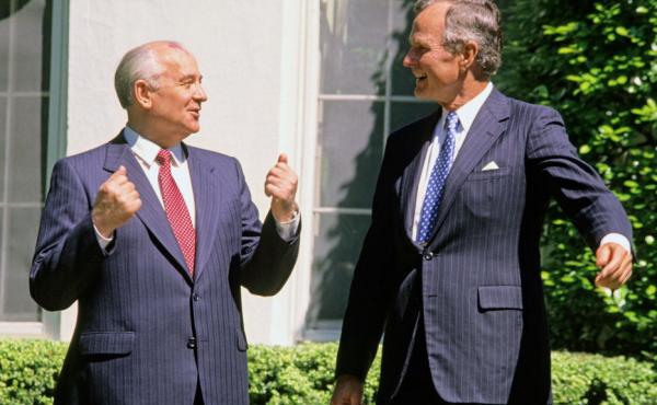 Soviet President Mikhail Gorbachev (left) and former U.S. President George H.W. Bush share a light moment together outside the White House in 1990. Could they be discussing chicken? Soviet President Mikhail Gorbachev (left) and former U.S. President George H.W. Bush share a light moment together outside the White House in 1990. Could they be discussing chicken?