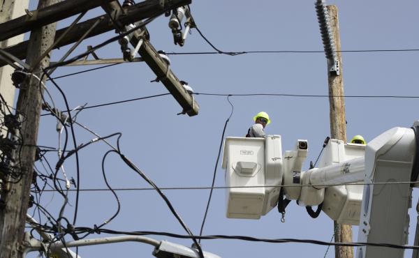 A lineman from the Electric Power Authority repairs distribution lines damaged by Hurricane Maria in Puerto Rico. A lineman from the Electric Power Authority repairs distribution lines damaged by Hurricane Maria in Puerto Rico.