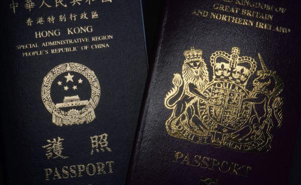 A British National Overseas passport (right) and China's Hong Kong Special Administrative Region passport. China said Friday it will no longer recognize the BNO passport as a valid travel document or form of identification. A British National Overseas passport (right) and China's Hong Kong Special Administrative Region passport. China said Friday it will no longer recognize the BNO passport as a valid travel document or form of identification.
