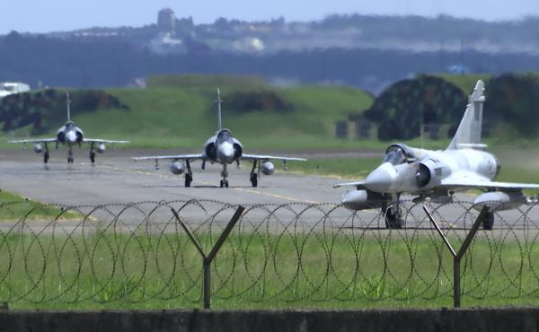 Taiwan Air Force Mirage fighter jets taxi on a runway at an airbase in Hsinchu, Taiwan, on Friday. China says it summoned European diplomats in the country to protest statements issued by the Group of Seven nations and the European Union criticizing threa Taiwan Air Force Mirage fighter jets taxi on a runway at an airbase in Hsinchu, Taiwan, on Friday. China says it summoned European diplomats in the country to protest statements issued by the Group of Seven nations and the European Union criticizing threa