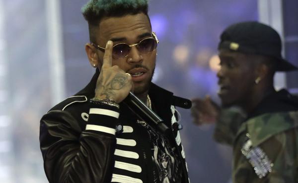 Chris Brown performs during Fashion Week last fall in Milan, Italy. The Paris prosecutor says the singer and two other individuals were arrested. Brown has been accused of rape and narcotics possession. Chris Brown performs during Fashion Week last fall in Milan, Italy. The Paris prosecutor says the singer and two other individuals were arrested. Brown has been accused of rape and narcotics possession.