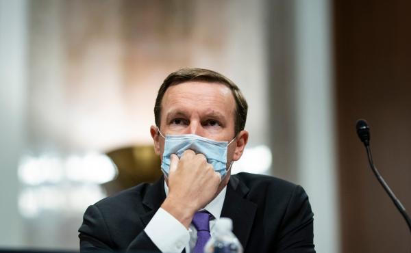 In his new book, Sen. Chris Murphy, D-Conn., outlines the history of the Second Amendment and why gun violence is as bad as it is today. Above, Murphy listens during during a Senate hearing on June 30, 2020. In his new book, Sen. Chris Murphy, D-Conn., outlines the history of the Second Amendment and why gun violence is as bad as it is today. Above, Murphy listens during during a Senate hearing on June 30, 2020.
