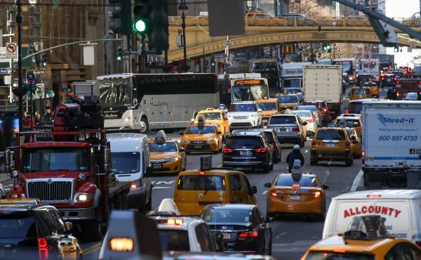 Traffic moves along 42nd Street in Midtown Manhattan on Jan. 25, 2018. After decades of efforts by transportation advocates, the state of New York has approved a plan to add congestion pricing to the city, charging drivers who enter a designated zone of M Traffic moves along 42nd Street in Midtown Manhattan on Jan. 25, 2018. After decades of efforts by transportation advocates, the state of New York has approved a plan to add congestion pricing to the city, charging drivers who enter a designated zone of M