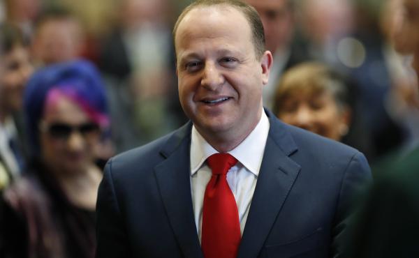 Colorado Gov. Jared Polis, pictured in January, signed a bill into law on Wednesday placing a $100 per month cap on insulin co-payments starting next year. Colorado Gov. Jared Polis, pictured in January, signed a bill into law on Wednesday placing a $100 per month cap on insulin co-payments starting next year.