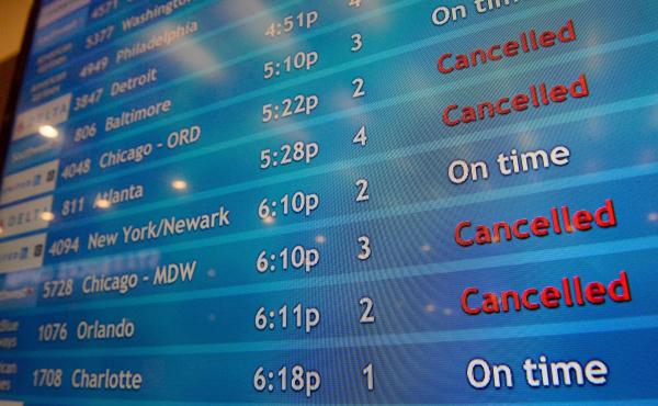 A screen shows canceled incoming flights at T.F. Green International Airport in Warwick, R.I., on March 30, 2020. Consumer advocates and two senators say airlines are sitting on nearly $15 billion in refunds owed to customers for canceled travel. A screen shows canceled incoming flights at T.F. Green International Airport in Warwick, R.I., on March 30, 2020. Consumer advocates and two senators say airlines are sitting on nearly $15 billion in refunds owed to customers for canceled travel.