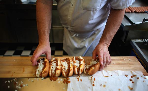 Rich Harlan prepares Coney hot dogs at his restaurant, Red Hots Coney Island, in Detroit. Harlan has been working at the restaurant for 48 years. Rich Harlan prepares Coney hot dogs at his restaurant, Red Hots Coney Island, in Detroit. Harlan has been working at the restaurant for 48 years.