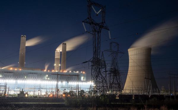 Steam rises from the Miller coal power plant in Adamsville, Ala., in April. An industry group says a climate plan in Congress would shut down all U.S. coal plants by 2030 or earlier. Steam rises from the Miller coal power plant in Adamsville, Ala., in April. An industry group says a climate plan in Congress would shut down all U.S. coal plants by 2030 or earlier.