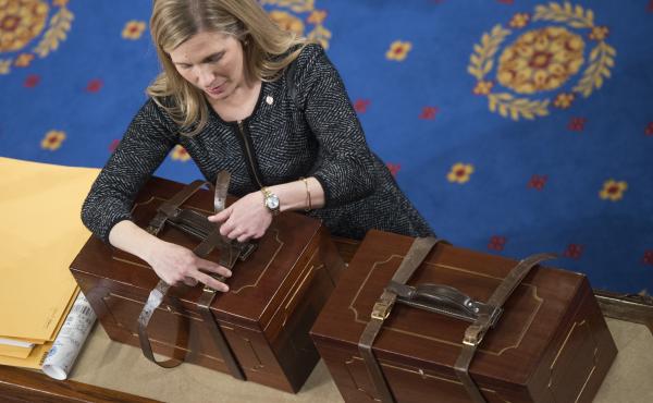 Connecticut is the latest state to pledge its electoral votes based on the outcome of the national popular vote. Here, an aide opens Electoral College ballot boxes during a joint session of Congress in January of 2017, to tally ballots for the president a Connecticut is the latest state to pledge its electoral votes based on the outcome of the national popular vote. Here, an aide opens Electoral College ballot boxes during a joint session of Congress in January of 2017, to tally ballots for the president a