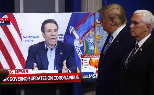 Some 78% of New York voters say they trust Gov. Andrew Cuomo to decide when to reopen their state, compared to 16% who say they trust President Trump. Here, Trump and Vice President Mike Pence watch a video of Cuomo speaking, during a coronavirus task for Some 78% of New York voters say they trust Gov. Andrew Cuomo to decide when to reopen their state, compared to 16% who say they trust President Trump. Here, Trump and Vice President Mike Pence watch a video of Cuomo speaking, during a coronavirus task for