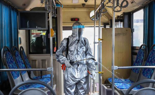 A worker disinfects the inside of a bus in Addis Ababa, Ethiopia. Transit agencies are taking new steps to reduce the risks for riders during the pandemic. A worker disinfects the inside of a bus in Addis Ababa, Ethiopia. Transit agencies are taking new steps to reduce the risks for riders during the pandemic.