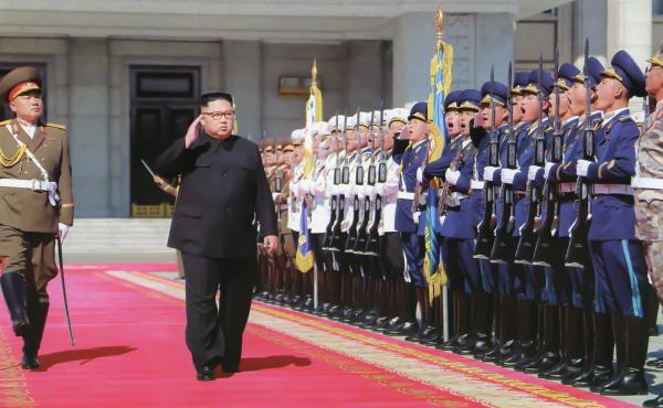 Kim Jong Un inspects troops ahead of North Korea's 70th anniversary parade in Pyongyang in 2018. At least one foreign policy expert warns that U.S. adversaries could take advantage of the uncertainty stemming from President Trump's positive coronavirus te Kim Jong Un inspects troops ahead of North Korea's 70th anniversary parade in Pyongyang in 2018. At least one foreign policy expert warns that U.S. adversaries could take advantage of the uncertainty stemming from President Trump's positive coronavirus te