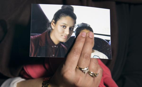 The eldest sister of Shamima Begum holds her sister's photo in 2015. Begum, who left London to join the Islamic State organization as a teenager, is now trying to return to the U.K. to argue that her British citizenship should not have been revoked. The eldest sister of Shamima Begum holds her sister's photo in 2015. Begum, who left London to join the Islamic State organization as a teenager, is now trying to return to the U.K. to argue that her British citizenship should not have been revoked.