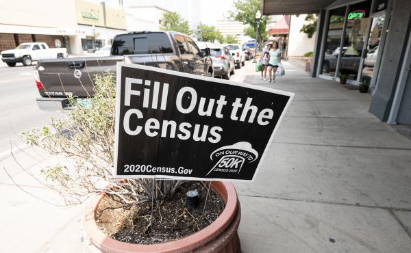 A sign promoting the 2020 census stands in a planter in Roswell, N.M., in August. A federal judge has ordered the Trump administration to continue holding off on wrapping up the census for now. A sign promoting the 2020 census stands in a planter in Roswell, N.M., in August. A federal judge has ordered the Trump administration to continue holding off on wrapping up the census for now.