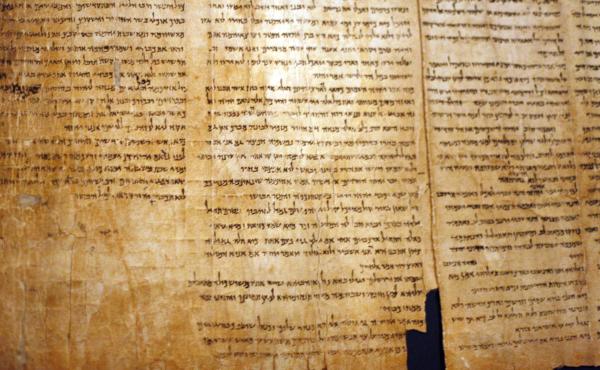 A part of the Isaiah Scroll, one of the Dead Sea Scrolls, is seen inside the vault of the Shrine of the Book building at the Israel Museum in Jerusalem. A part of the Isaiah Scroll, one of the Dead Sea Scrolls, is seen inside the vault of the Shrine of the Book building at the Israel Museum in Jerusalem.
