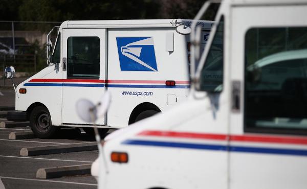 U.S. Postal Service mail vehicles sit in a parking lot at a mail distribution center on February 18, 2015 in San Francisco, Calif. U.S. Postal Service mail vehicles sit in a parking lot at a mail distribution center on February 18, 2015 in San Francisco, Calif.