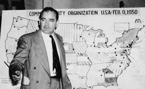 Sen. Joe McCarthy, R-Wis., testifies during hearings in Washington, D.C., on June 9, 1954. McCarthy stands before a map that charts alleged communist activity in the United States. Sen. Joe McCarthy, R-Wis., testifies during hearings in Washington, D.C., on June 9, 1954. McCarthy stands before a map that charts alleged communist activity in the United States.