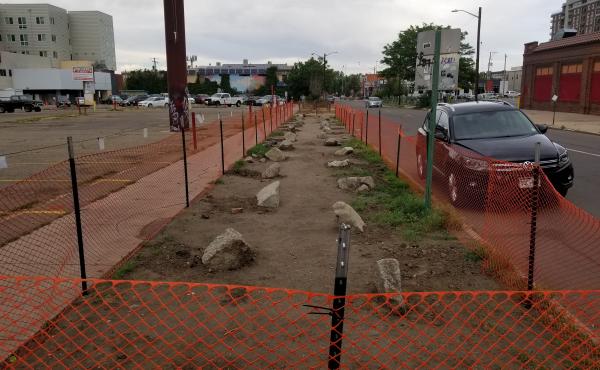 Plastic fencing and landscaping boulders replaced homeless campsites on this block in downtown Denver. Advocates for the homeless fear that displacing encampments risks spreading the coronavirus throughout the homeless community. Plastic fencing and landscaping boulders replaced homeless campsites on this block in downtown Denver. Advocates for the homeless fear that displacing encampments risks spreading the coronavirus throughout the homeless community.