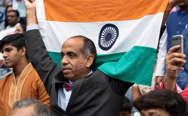 A man holds up an Indian flag during a rally with President Trump and Prime Minister Modi in Houston in September 2019. Trump and Modi have spoken of their friendship, but most Indian Americans say U.S.-India ties are low on their political priorities. A man holds up an Indian flag during a rally with President Trump and Prime Minister Modi in Houston in September 2019. Trump and Modi have spoken of their friendship, but most Indian Americans say U.S.-India ties are low on their political priorities.