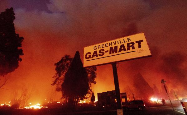 Flames consume buildings as the Dixie Fire tears through the Greenville community of Plumas County, Calif., on Aug. 4, 2021. Flames consume buildings as the Dixie Fire tears through the Greenville community of Plumas County, Calif., on Aug. 4, 2021.
