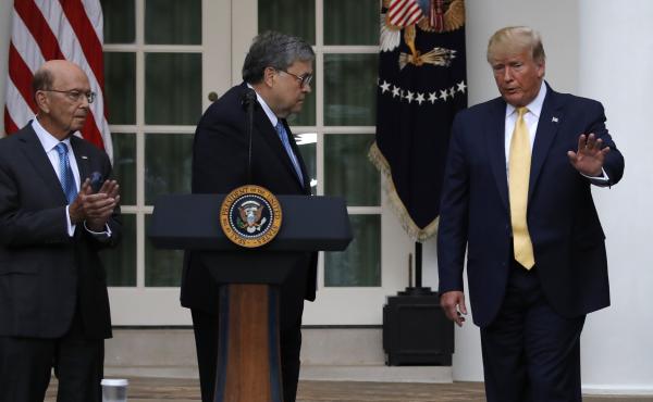 President Trump is joined by Commerce Secretary Wilbur Ross (left) and Attorney General William Barr during a July event at the White House announcing that his administration is relying on federal agency records to produce citizenship data. President Trump is joined by Commerce Secretary Wilbur Ross (left) and Attorney General William Barr during a July event at the White House announcing that his administration is relying on federal agency records to produce citizenship data.