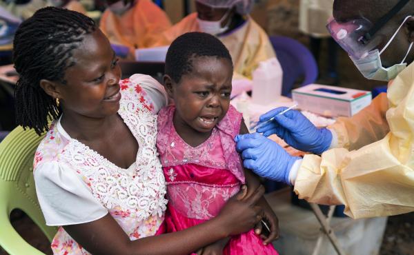 A girl receives the Ebola vaccine in Beni, Democratic Republic of Congo. A girl receives the Ebola vaccine in Beni, Democratic Republic of Congo.