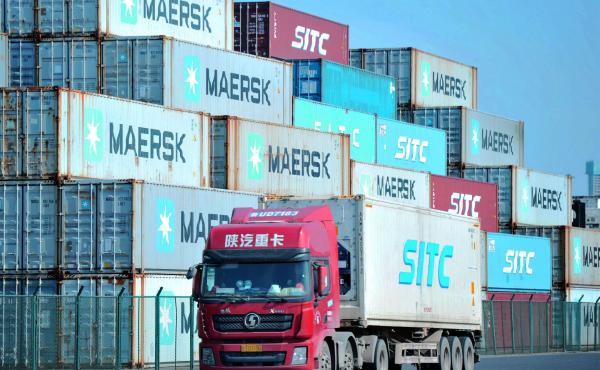 Containers are stacked at the port in Qingdao, in China's eastern Shandong province. A new trade deal dictates that China buy more from the U.S., but that has other trading partners worried. Containers are stacked at the port in Qingdao, in China's eastern Shandong province. A new trade deal dictates that China buy more from the U.S., but that has other trading partners worried.