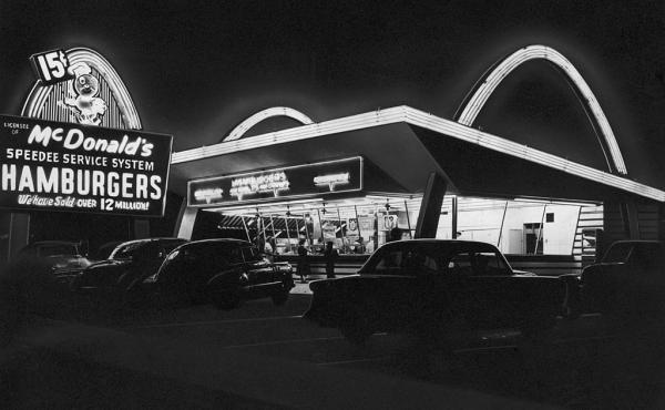 A view of a McDonald's fast-food restaurant in Des Plaines, Ill., circa 1955. A new book explores the complicated bond between Americans and fast food. A view of a McDonald's fast-food restaurant in Des Plaines, Ill., circa 1955. A new book explores the complicated bond between Americans and fast food.