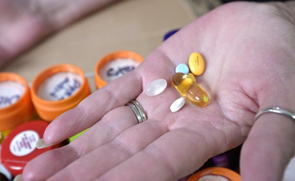 Retiree Donna Weiner shows some of the daily prescription medications for which she pays more than $6,000 per year through a Medicare prescription drug plan. She supports giving Medicare authority to negotiate drug prices. Retiree Donna Weiner shows some of the daily prescription medications for which she pays more than $6,000 per year through a Medicare prescription drug plan. She supports giving Medicare authority to negotiate drug prices.
