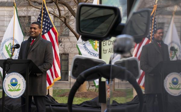 Environmental Protection Agency Administrator Michael Regan is reflected in an electronic vehicle as it charges as he speaks during an event to announce a final rule for federal greenhouse gas emissions standards for cars and trucks on Monday. Environmental Protection Agency Administrator Michael Regan is reflected in an electronic vehicle as it charges as he speaks during an event to announce a final rule for federal greenhouse gas emissions standards for cars and trucks on Monday.