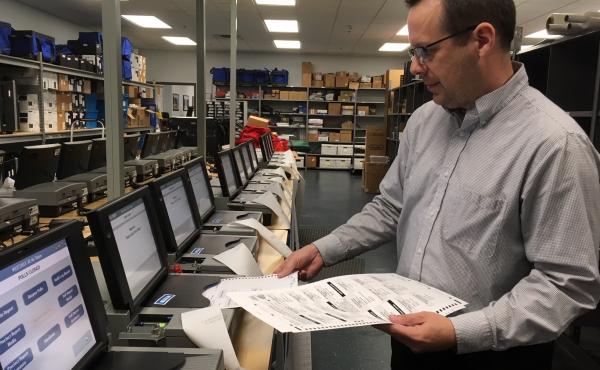 Gaston County Elections Director Adam Ragan tests equipment. Gaston County Elections Director Adam Ragan tests equipment.