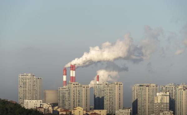 Smokestacks belch in Weihai, in China's Shandong province, in 2019. China is set to surpass pre-pandemic levels of carbon dioxide emissions this year. Smokestacks belch in Weihai, in China's Shandong province, in 2019. China is set to surpass pre-pandemic levels of carbon dioxide emissions this year.