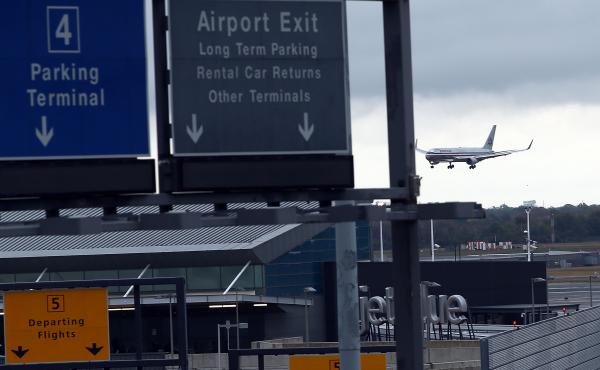 A plane arrives at New York's John F. Kennedy International Airport. Since Ebola screenings began Saturday, none of the 91 passengers identified as having an increased risk of an Ebola infection was found to be sick, the CDC says. A plane arrives at New York's John F. Kennedy International Airport. Since Ebola screenings began Saturday, none of the 91 passengers identified as having an increased risk of an Ebola infection was found to be sick, the CDC says.
