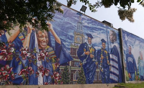 A graduation themed mural is seen in July 2021 on the Howard University campus in Washington. A graduation themed mural is seen in July 2021 on the Howard University campus in Washington.