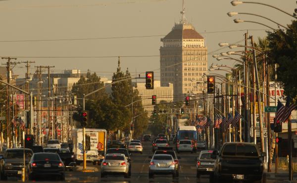 Traffic on a hazy evening in Fresno, Calif. A new study estimates that about 50,000 lives could be saved each year if the U.S. eliminated small particles of pollution that are released from the tailpipes of cars and trucks, among other sources. Traffic on a hazy evening in Fresno, Calif. A new study estimates that about 50,000 lives could be saved each year if the U.S. eliminated small particles of pollution that are released from the tailpipes of cars and trucks, among other sources.