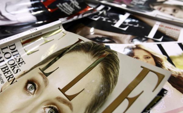 A file picture taken in January 2011 in Paris shows covers of some of the 42 foreign editions of the French fashion magazine "Elle", owned by French media conglomerate Lagardere. A file picture taken in January 2011 in Paris shows covers of some of the 42 foreign editions of the French fashion magazine "Elle", owned by French media conglomerate Lagardere.