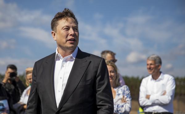 Tesla head Elon Musk talks to the press as he arrives to to have a look at the construction site of the new Tesla Gigafactory near Berlin last year. Tesla head Elon Musk talks to the press as he arrives to to have a look at the construction site of the new Tesla Gigafactory near Berlin last year.