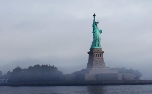 The Statue of Liberty, which stands on Ellis Island in New York Harbor, was the America's busiest immigrant inspection station from 1892 until 1954. The Statue of Liberty, which stands on Ellis Island in New York Harbor, was the America's busiest immigrant inspection station from 1892 until 1954.