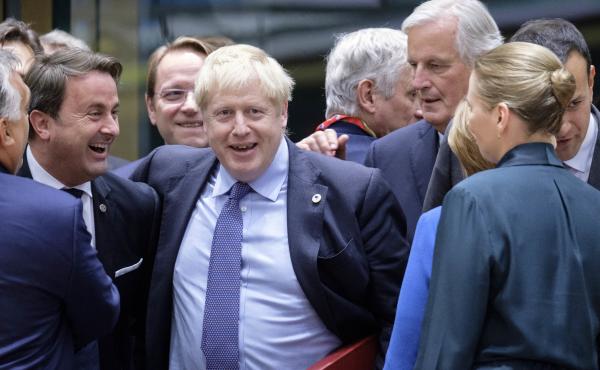 Luxembourg's Prime Minister Xavier Bettel (from left), U.K. Prime Minister Boris Johnson and the European Commission's chief Brexit negotiator, Michel Barnier, at the start of an EU summit on Thursday in Brussels. EU and British negotiators came to an agr Luxembourg's Prime Minister Xavier Bettel (from left), U.K. Prime Minister Boris Johnson and the European Commission's chief Brexit negotiator, Michel Barnier, at the start of an EU summit on Thursday in Brussels. EU and British negotiators came to an agr
