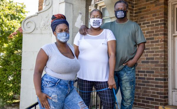 Heavenly Pettigrew, left, and her parents Stephanie and Robert outside their two-bedroom rental apartment in Milwaukee. Without assistance from the nonprofit Community Advocates, the family likely would have faced eviction after the pandemic forced Robert Heavenly Pettigrew, left, and her parents Stephanie and Robert outside their two-bedroom rental apartment in Milwaukee. Without assistance from the nonprofit Community Advocates, the family likely would have faced eviction after the pandemic forced Robert