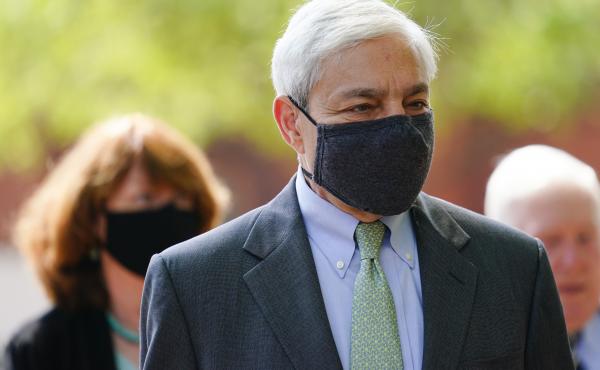 Former Penn State President Graham Spanier walks from the Dauphin County Courthouse in Harrisburg, Pa., after a hearing on Wednesday. A judge said Spanier must report to jail on July 9 to begin serving at least two months for endangering the welfare of ch Former Penn State President Graham Spanier walks from the Dauphin County Courthouse in Harrisburg, Pa., after a hearing on Wednesday. A judge said Spanier must report to jail on July 9 to begin serving at least two months for endangering the welfare of ch