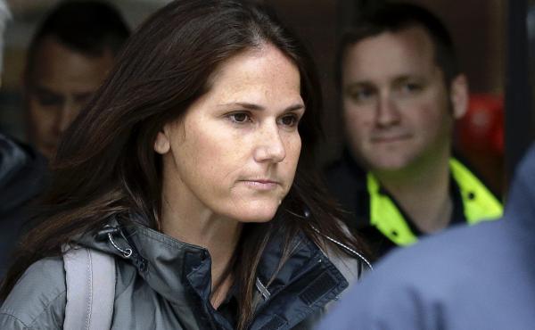 Former University of Southern California soccer coach Laura Janke exiting a Boston federal court Tuesday, where she pleaded guilty to charges in a nationwide college admissions bribery scandal. Former University of Southern California soccer coach Laura Janke exiting a Boston federal court Tuesday, where she pleaded guilty to charges in a nationwide college admissions bribery scandal.