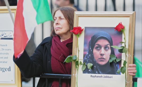 People gather opposite Downing Street during a protest against the execution of a young woman in Iran, in October of last year. Amnesty International says that Iran has undergone an "unprecedented spike" in executions in recent months. People gather opposite Downing Street during a protest against the execution of a young woman in Iran, in October of last year. Amnesty International says that Iran has undergone an "unprecedented spike" in executions in recent months.